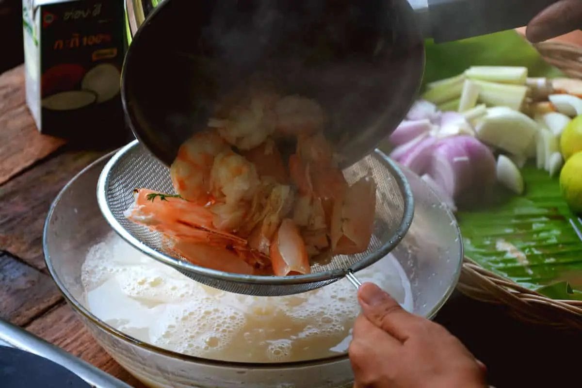 straining tom yum shrimp or prawn 