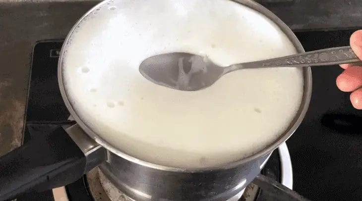 milk bubbling over getting ready for yogurt mix